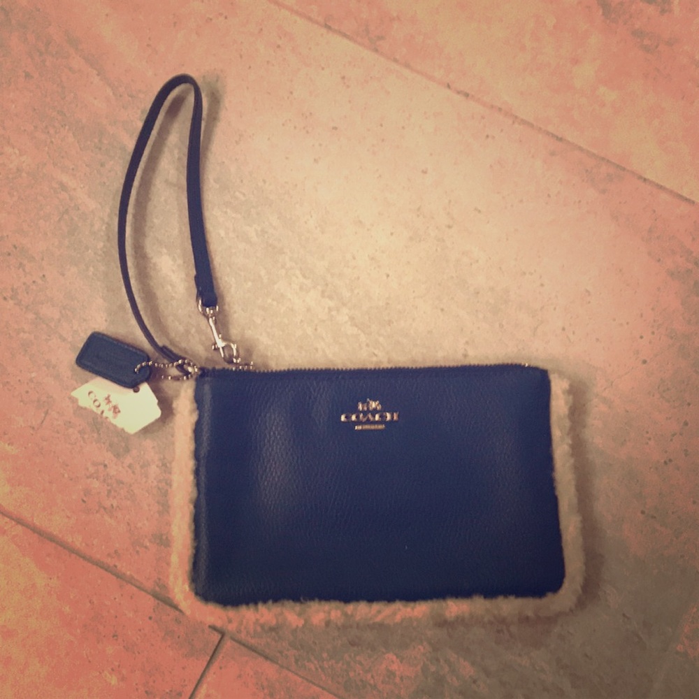 Never used blue Coach wristlet